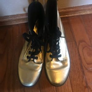 Gold dr Martines scratched up in good condition